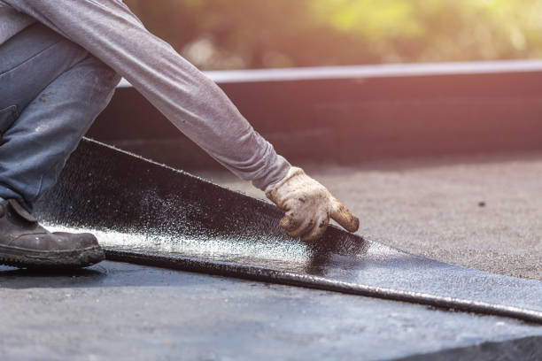 Professional Emergency Waterproofing technician working in Hopkins, MN